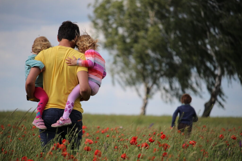 Dad with kids in field - What every kid needs to hear from their father