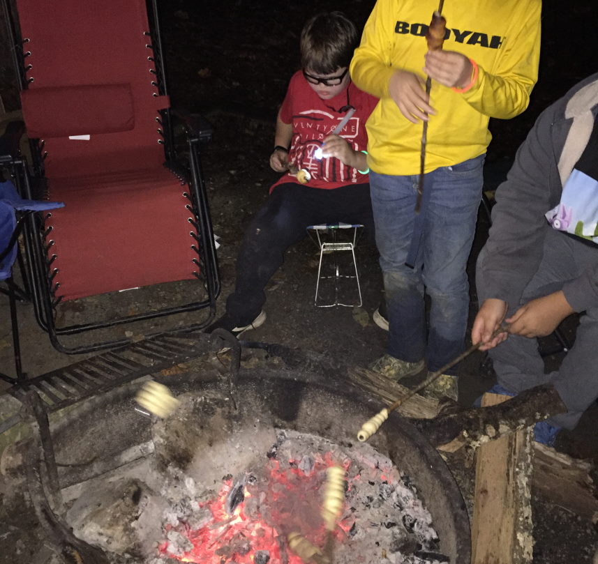 Parenting through the scout laws
Scouts cooking around a fire