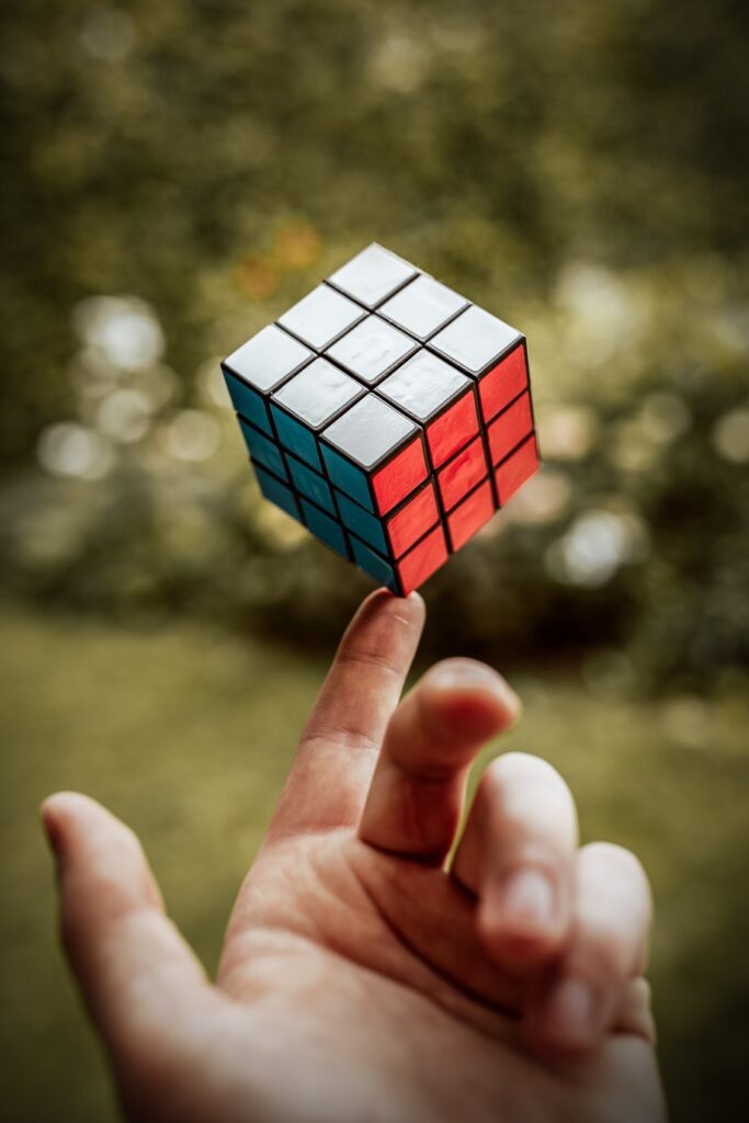 How to balance work and life as a dad - rubik's cube balanced on hand