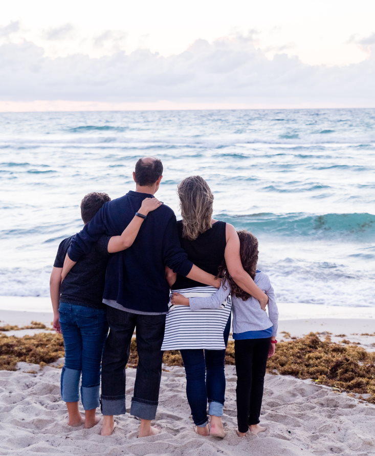 Dads just need to love their family - Family on beach