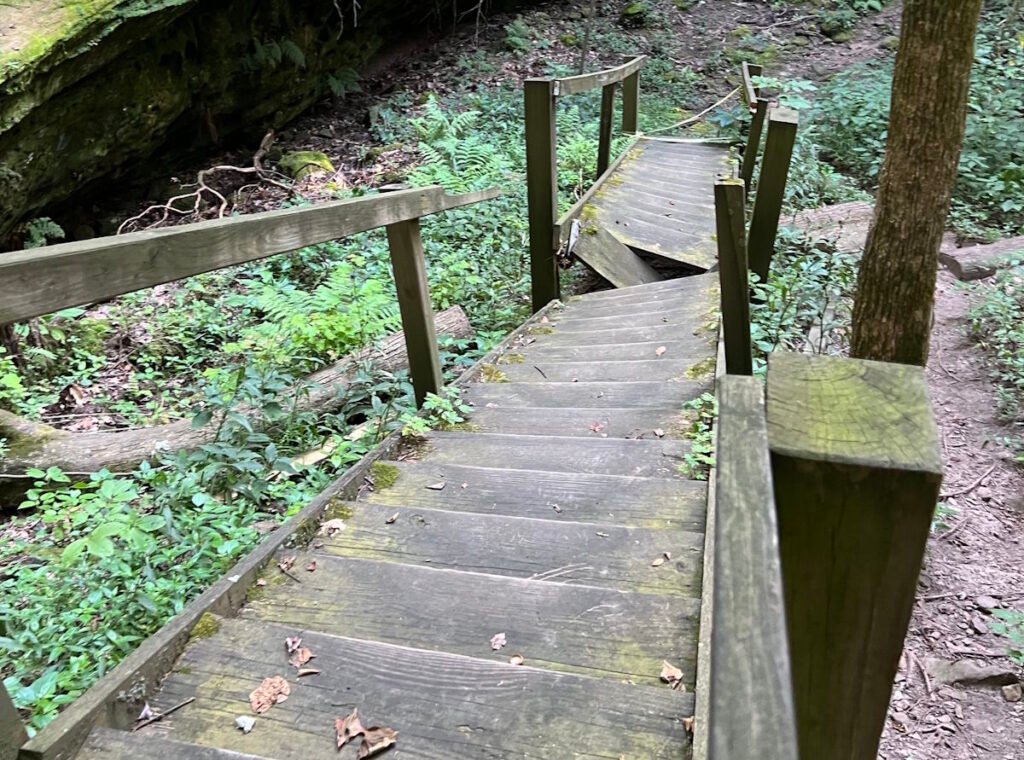 A broken stair case on a popular trail